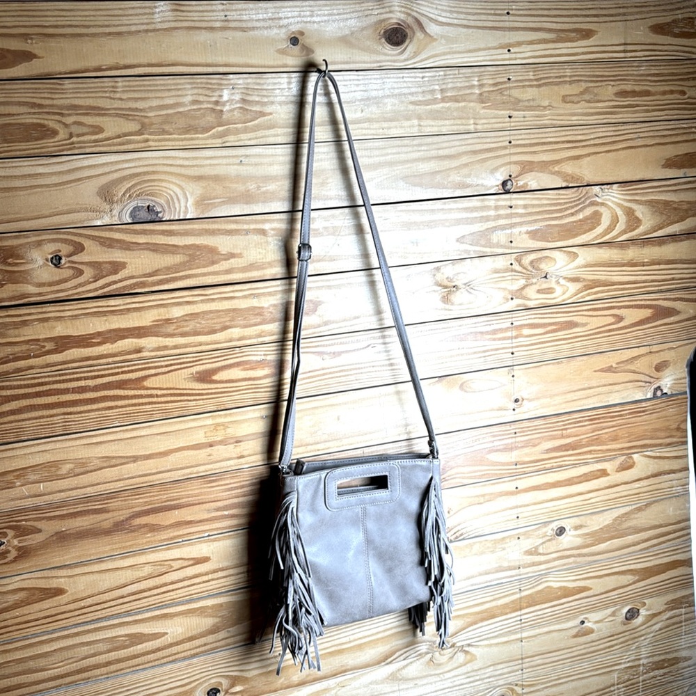 Beautiful tan fringe crossbody Maurice’s purse faux leather